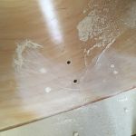 Shaving off the dowels, then sanding smooth.