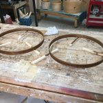 New maple bass-drum hoops being stained.