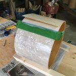 Cementing the overlap, adhesive setting up.