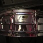 Examining the snare drum for the first time.