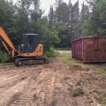 Hard to believe a 24' x 28' shed, roof, junk stored in it... all stuffed in that bin.