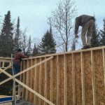 Terry laying out the roof, careful balance!